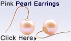pink colored round pearl earrings in 14k gold