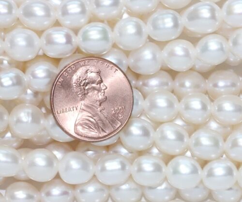 White 7-8mm AA+ Rice Shaped Pearl Strand,1.7mm holes