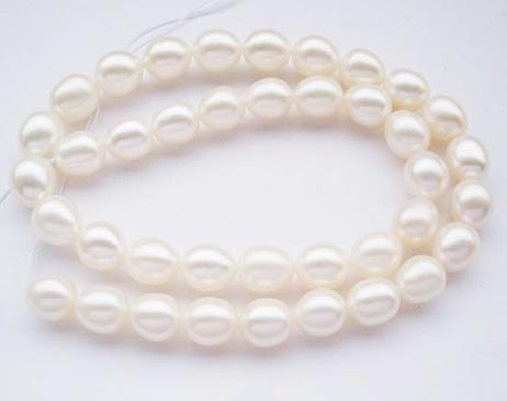 White 9-10mm AAA Rice or Oval Shaped Pearl Strand