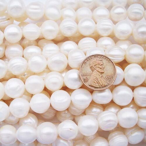 White 10-11mm Side Drilled Semi-Round Pearl Strands with Natural Dents