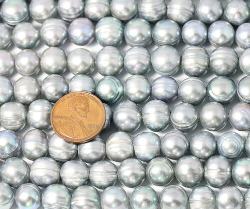 Grey 10-11mm Side Drilled Semi-Round Pearl Strands with Natural Dents