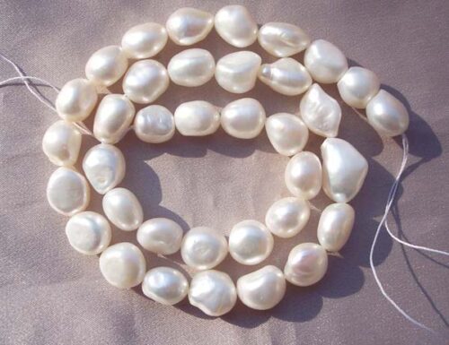 White 10-11mm Length Drilled High Quality Baroque Pearl Strand
