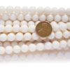 9-10mm White Round Coral Beads on Temporary Strand