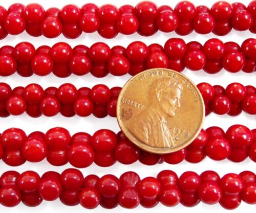 Red 5x8mm Center Drilled Coral in Peanut Shape on Temporary Strand