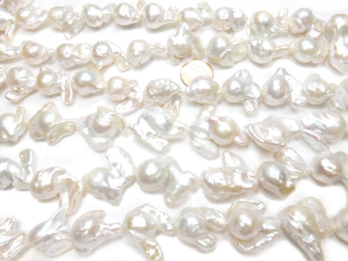 Highest quality White Big Fireball Baroque Pearls with Tails
