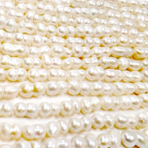 White colored 9x16mm Peanut Pearl Strand Length Drilled