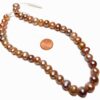 pink and lavender multi color 11mm semi-round pearl strand