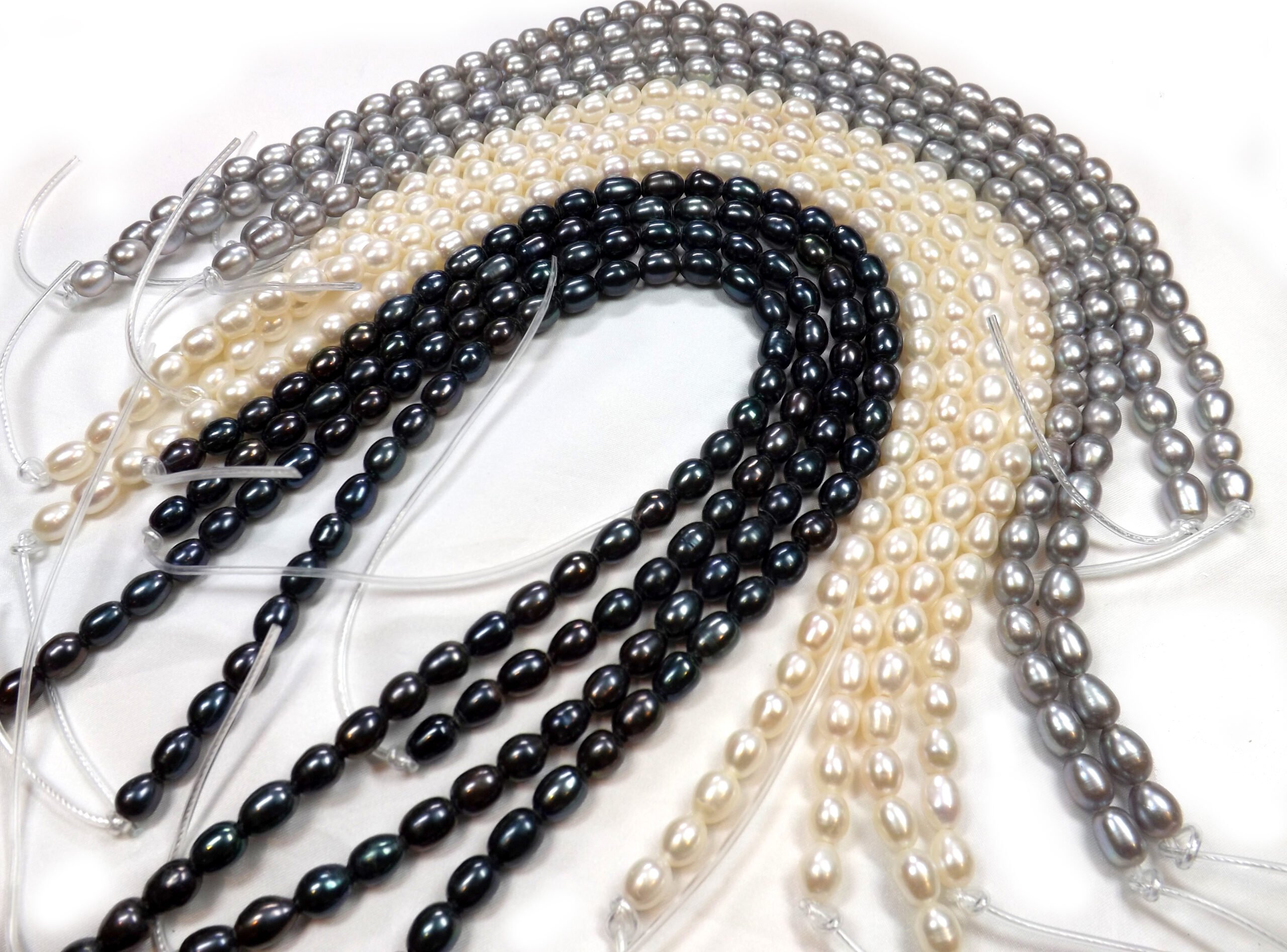 11-13mm Large Oval Shaped AA Quality White Rice Pearls Strands