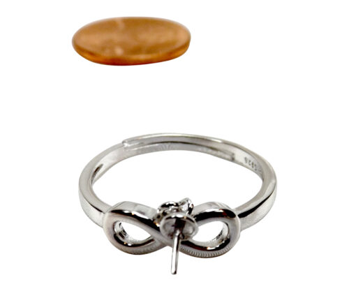 Pearl ring mounting in a dangling setting