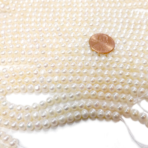 4-5mm semi-round pearl strands drilled with 0.9mm holes