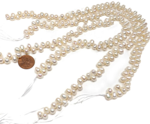 white 6x7mm peanut pearl strands with large holes
