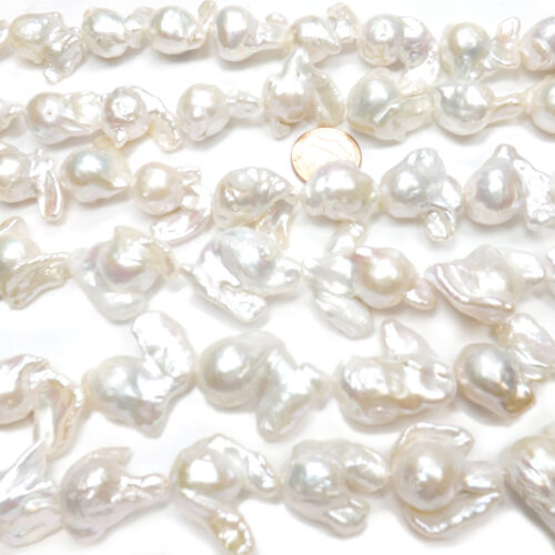 Highest quality White Big Fireball Baroque Pearls with Tails