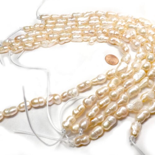 Length Drilled pink colored peanut pearl strands drilled 2.5mm holes