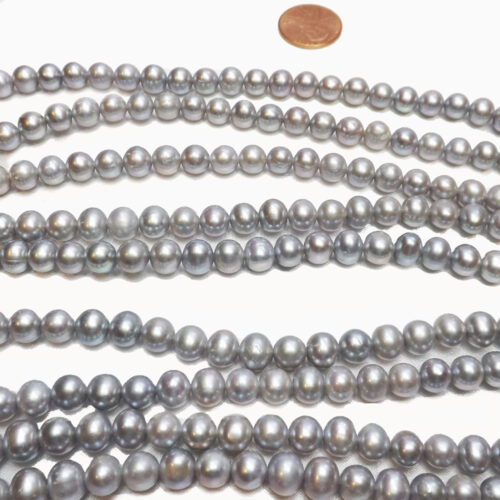 grey colored semi round pearl strand