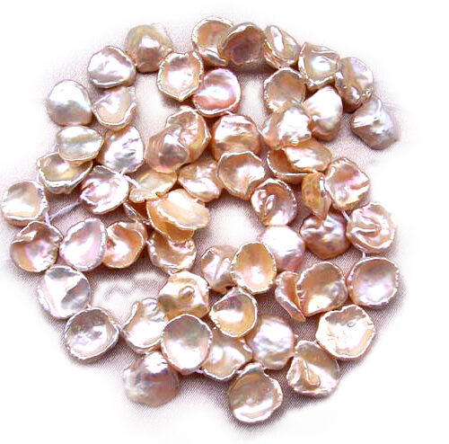 Huge Sized super high luster white pink or mauve keshi freshwater pearl strand rare