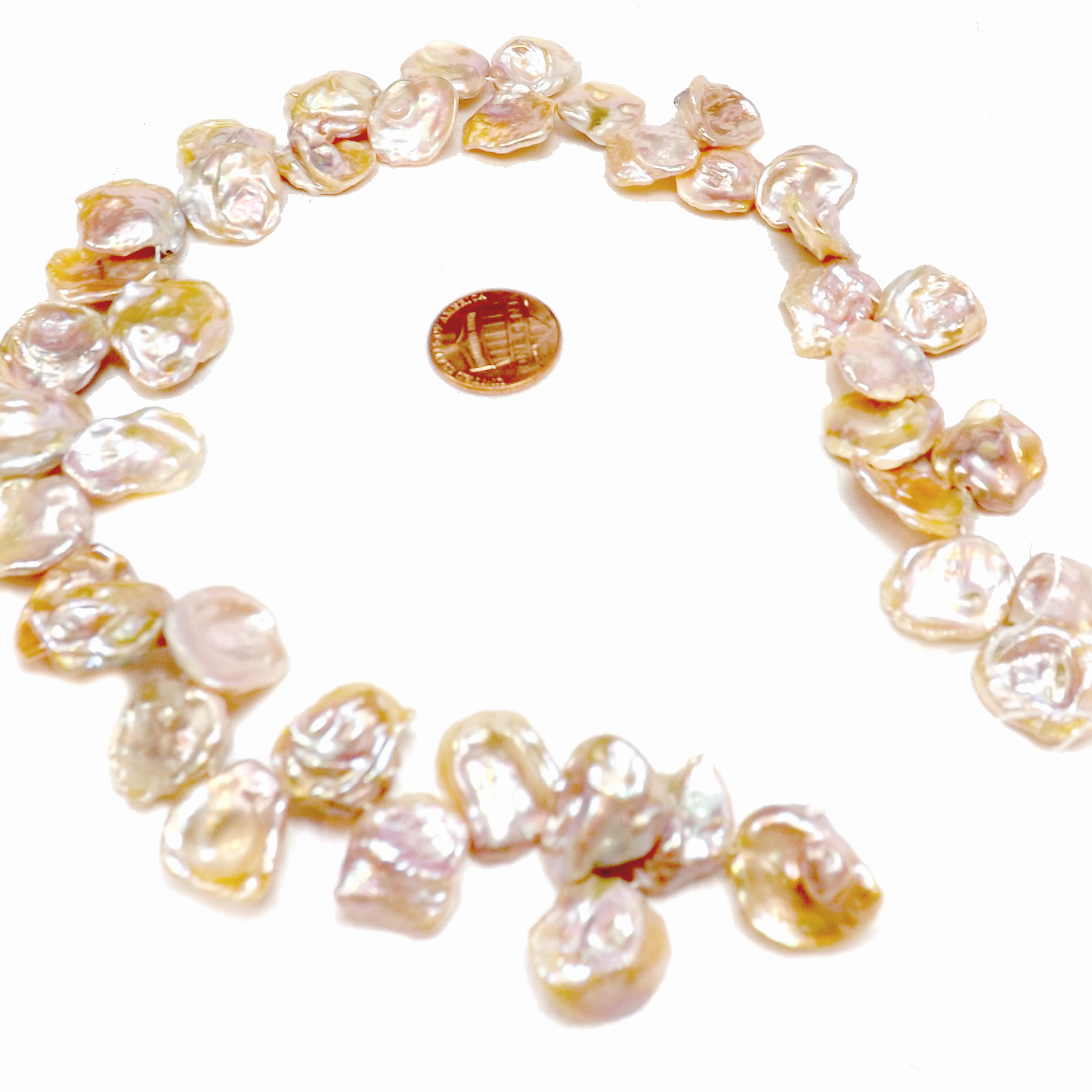 Mauve colored large keshi pearl strand