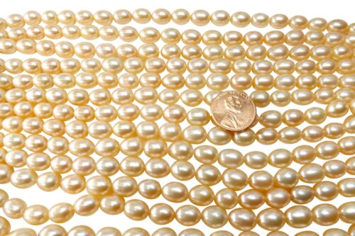 8-9mm pink colored rice or oval shaped pearl strands