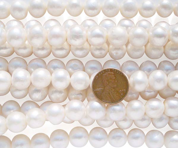 White 11-12mm Side Drilled Potato Pearls on Temporary Strand
