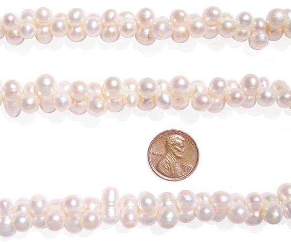 White 7x14mm Center Drilled Peanut Pearl Strand