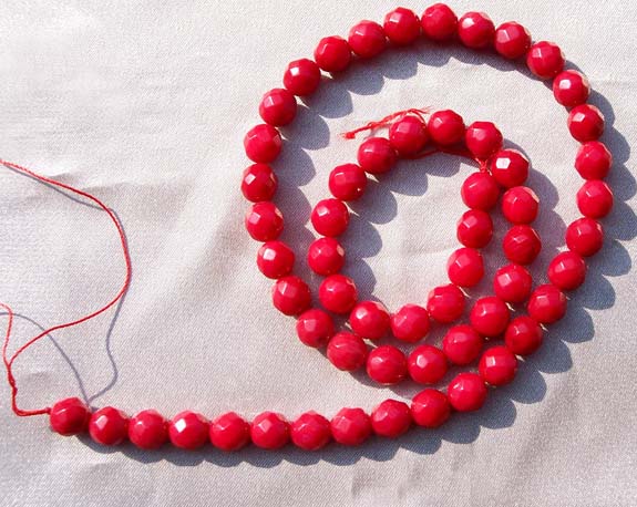 Red 7mm Faceted Round Coral Beads on Temporary Strand