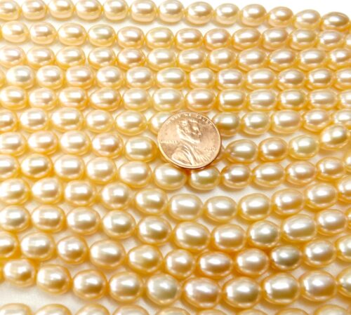 8-9mm pink colored rice or oval shaped pearl strands