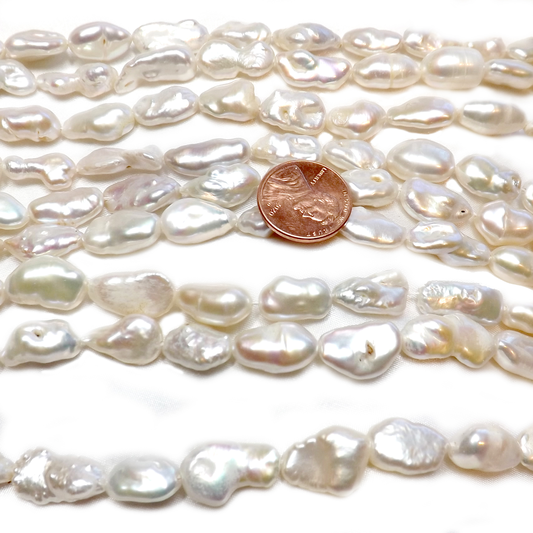 White Length Drilled Smaller Biwa Loose Pearl Strand