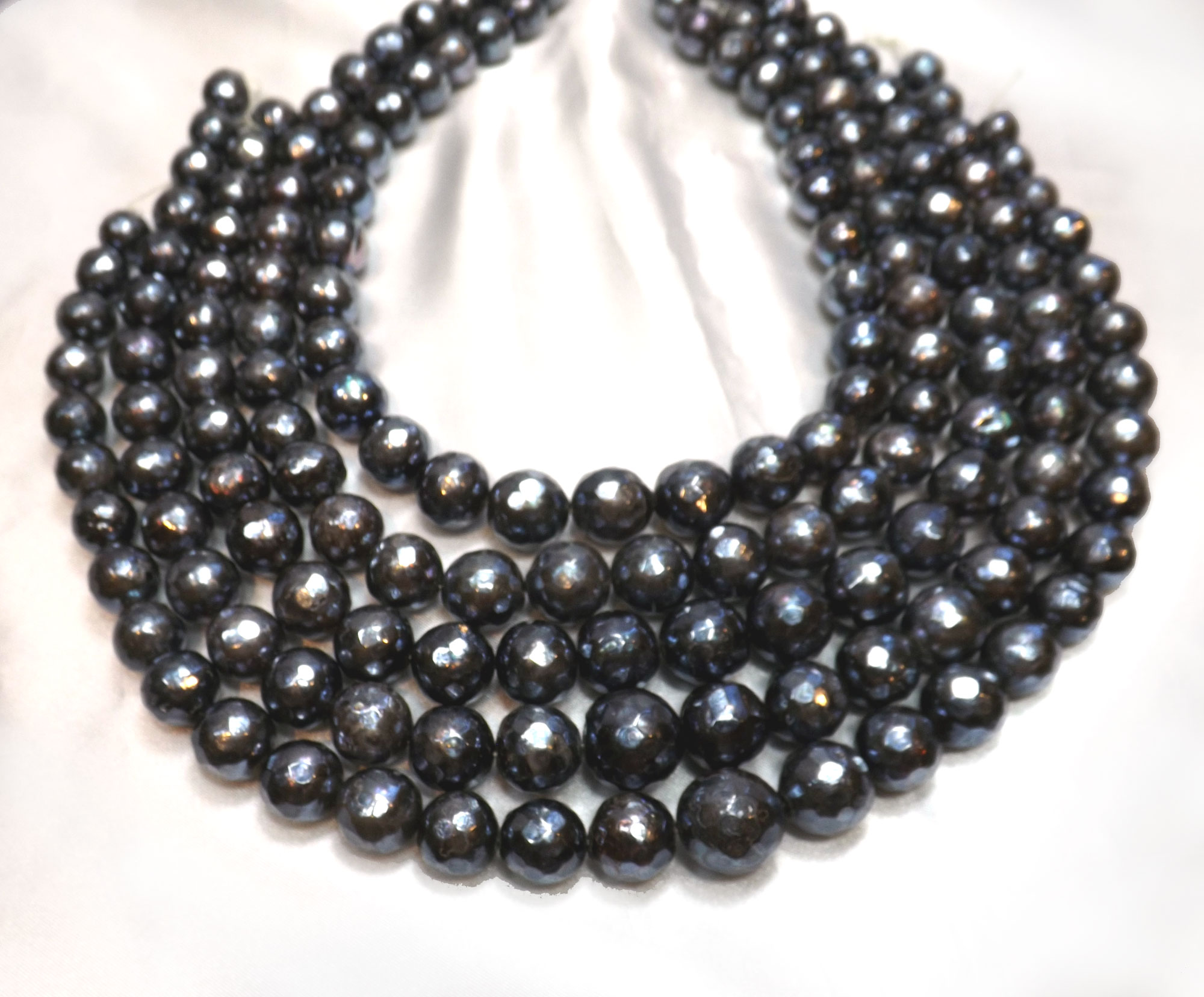 10-14mm hand carved round pearl strands