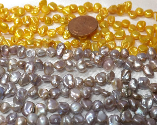 gold and gray colored keshi pearl strands