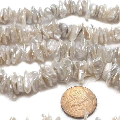 greyish white colored center drilled 7-9mm keshi pearl strand
