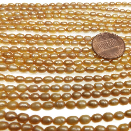 3-4mm Champagne colored Rice Pearls Strand